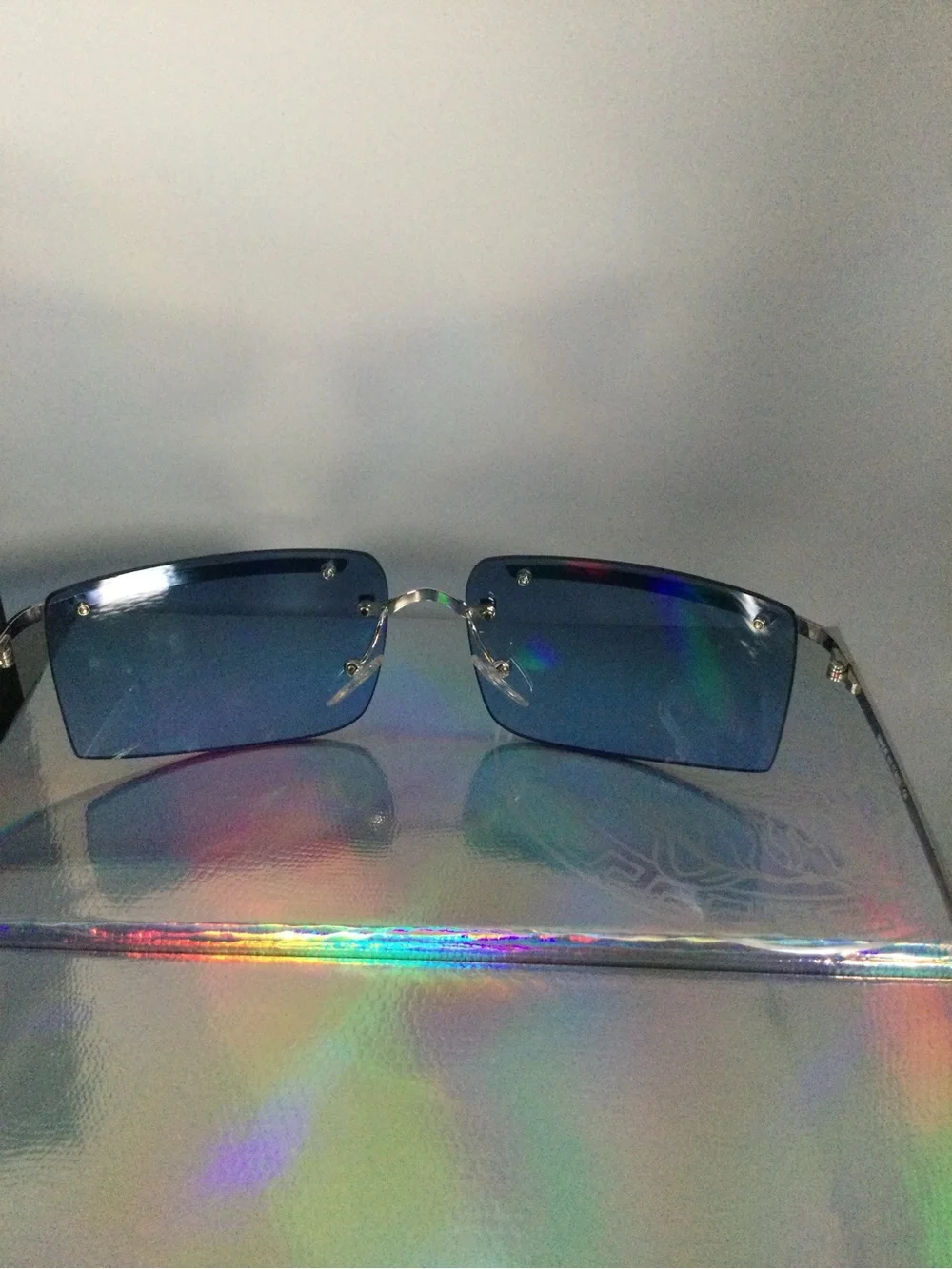 Loewe Silver Mirrored Rimless Sunglasses with Blue Tint